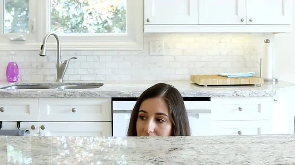 Melissa Maker using the eye level test to clean her kitchen!